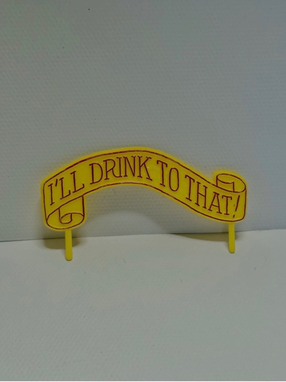 “I’ll Drink to That!” Vintage Decorative Cake Topper from Germany Yellow w/ Red